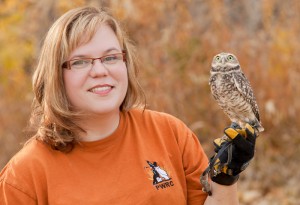 Lisa Tretiak with a burrowning owl