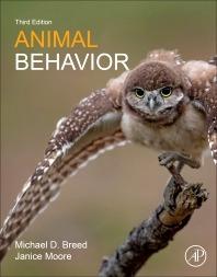 cover of book Animal Behavior with a burrowling owl standing on a branch with wings outstretched
